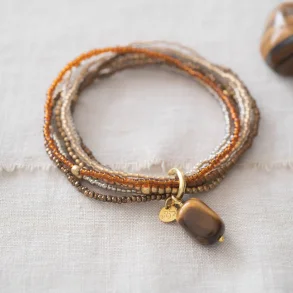 A Beautiful Story - Nirmala Amrbnd - Tiger Eye GC