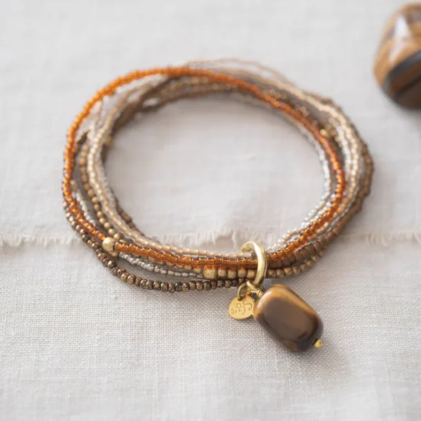 A Beautiful Story - Nirmala Amrbnd - Tiger Eye GC